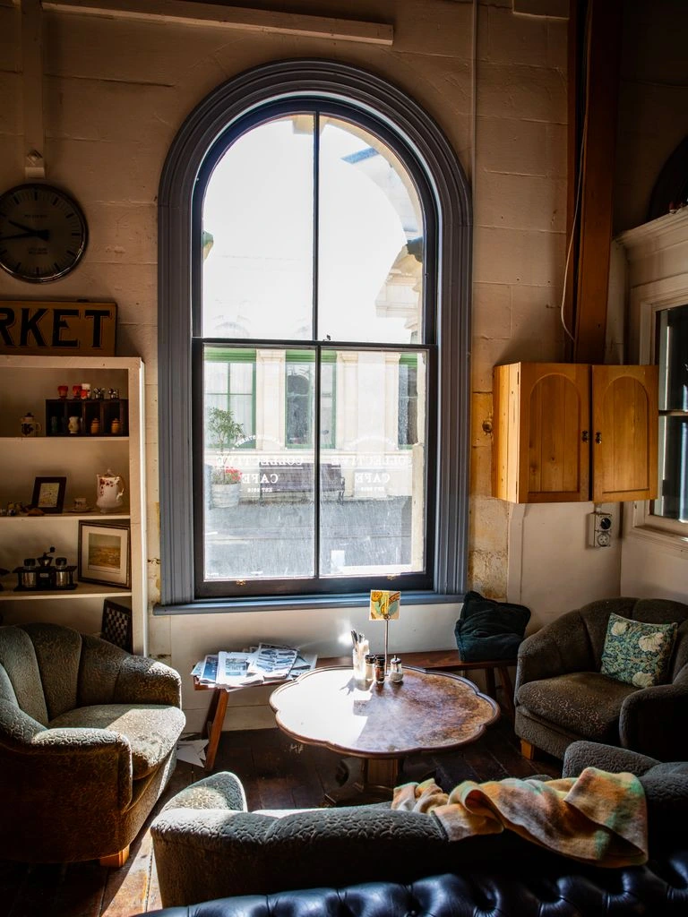 Afternoon light through the sliding door of a Four Seasons Motel studio unit